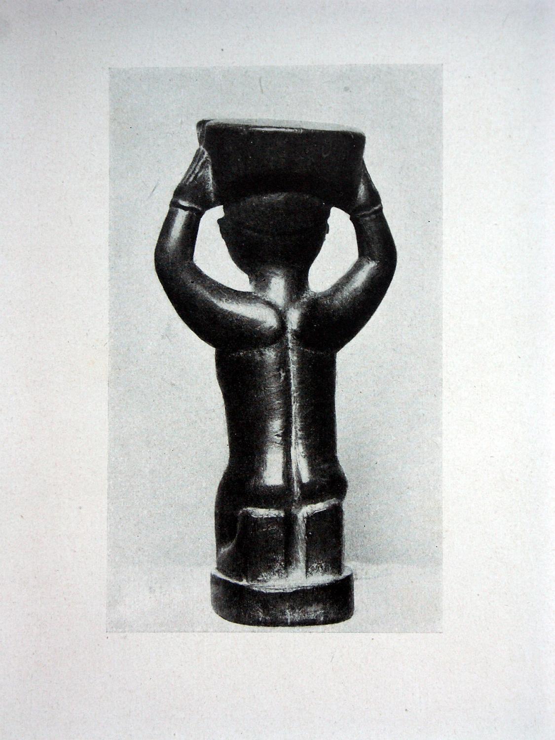 zz-eins20,s.058 (kongo,frau-holz-figur) rückansicht